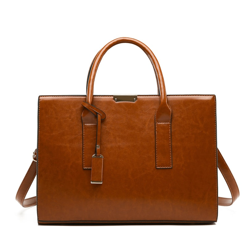 Hélène Paris | Ensemble sac et deux portefeuilles en cuir véritable