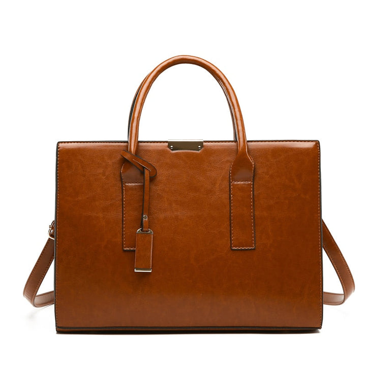 Hélène Paris | Ensemble sac et deux portefeuilles en cuir véritable