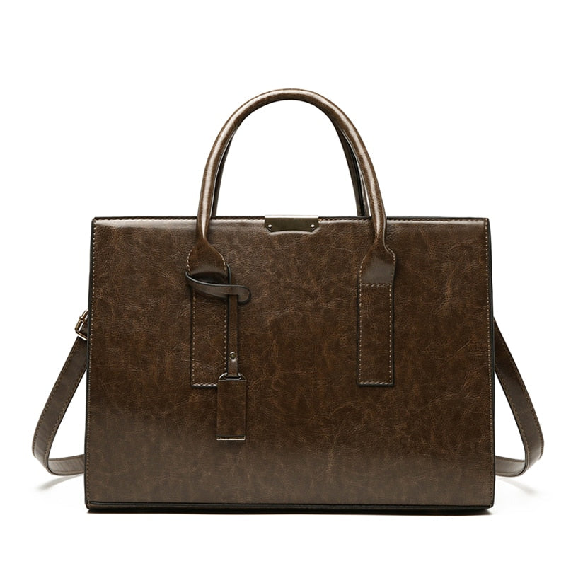 Hélène Paris | Ensemble sac et deux portefeuilles en cuir véritable