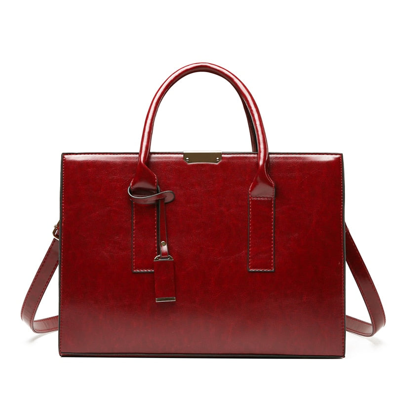 Hélène Paris | Ensemble sac et deux portefeuilles en cuir véritable