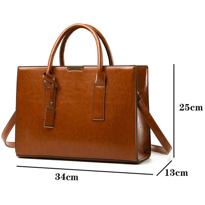Hélène Paris | Ensemble sac et deux portefeuilles en cuir véritable